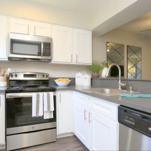 Model kitchen with hardwood floors at Ellington Apartments in Davis, California