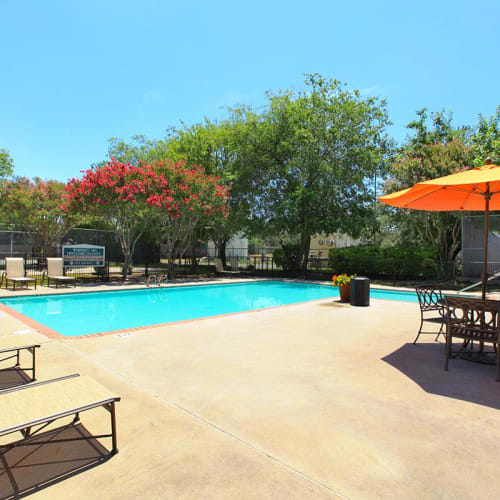 The sparkling community pool at The Granite at Tuscany Hills in San Antonio, Texas