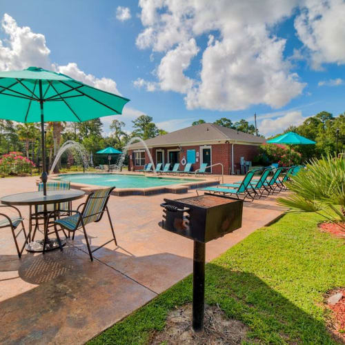Grill by the swimming pool at Oceanaire Apartments in Biloxi, Mississippi