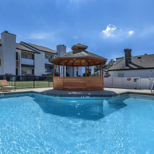 Pool with a gazebo on the deck at Tides on Randol West in Fort Worth, Texas
