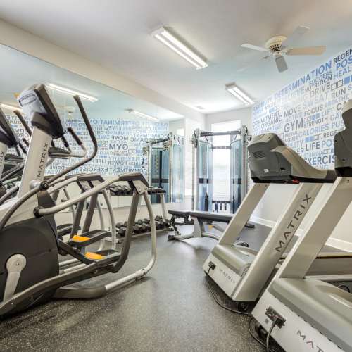 Cardio machines and weights in the high-tech fitness center at Webster Green in Webster, New York