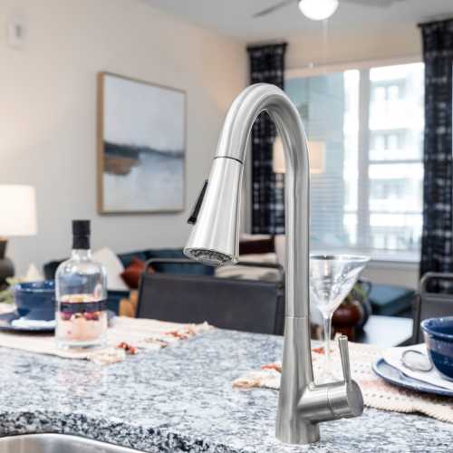 Stainless-steel sink faucet in a model home at The Station at San Marco in Jacksonville, Florida