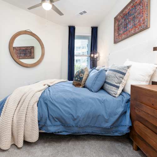Bedroom in a model home at The Station at San Marco in Jacksonville, Florida
