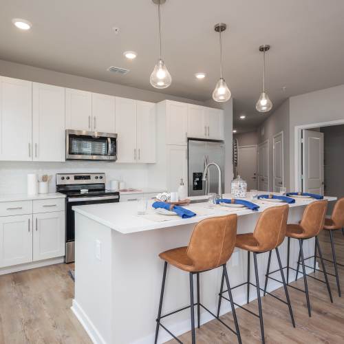 Kitchen island with bar seating at The Residences at Enso in Jacksonville, Florida