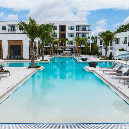Our swimming pool and apartments at The Residences at Enso in Jacksonville, Florida