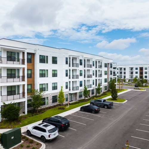 Apartments and parking lot at The Residences at Enso in Jacksonville, Florida