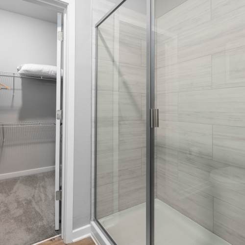 Walk-in shower in an apartment at The Residences at Enso in Jacksonville, Florida