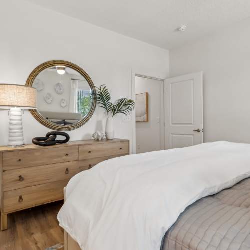 Bedroom with own bathroom, wood flooring at Hamlet at Wildlight in Yulee, Florida