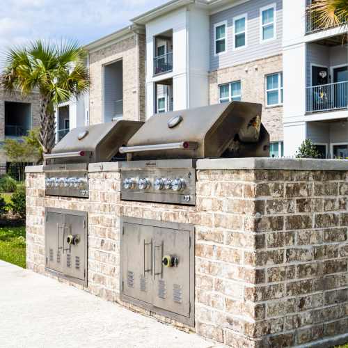 Outdoor grilling stations for residents at Reserve at River Place in Youngsville, Louisiana