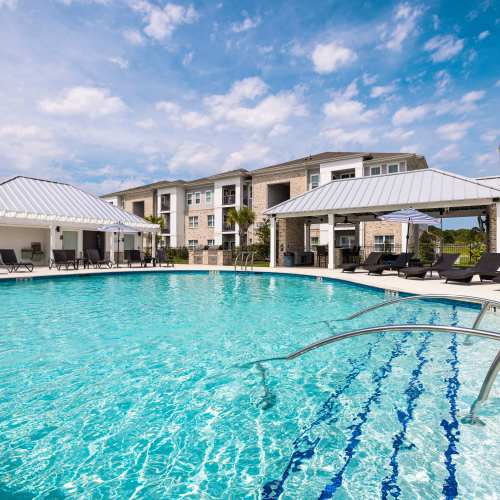 The sparkling community swimming pool at Reserve at River Place in Youngsville, Louisiana