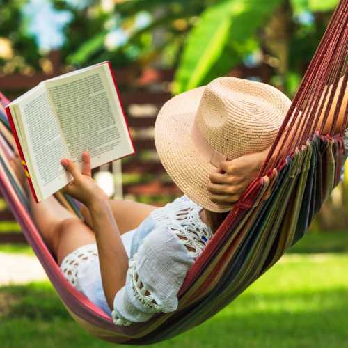 A resident relaxes in a hammock near Granite Creek, Rocklin, California