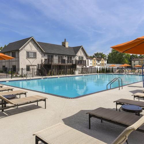 Poolside lounge chairs and tables at The Addison, North Wales, Pennsylvania