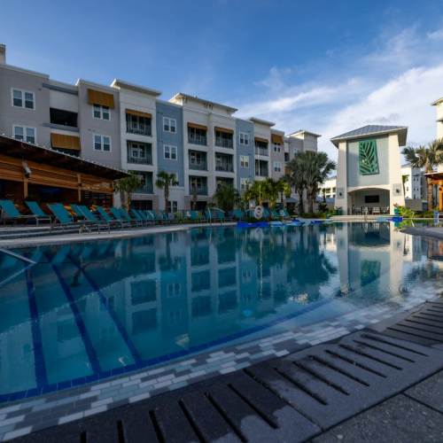 Covered seating next to the pool at Mallory Square at Lake Nona in Orlando, Florida