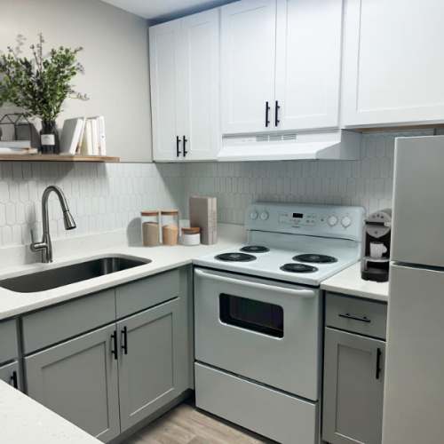 Kitchen bar area at Belmont Place Apartments in Nashville, Tennessee