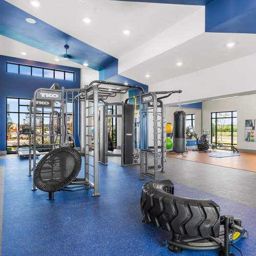 Resident using the fitness center at Brio Parc in Madison, Alabama