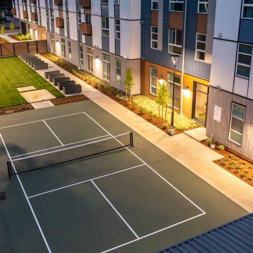 Evening photo of pickle ball court at Traditions at Hazelwood in Portland, Oregon