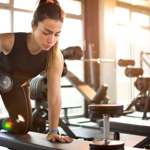 Resident lifting weights at Zinc 1501 in Sacramento, California