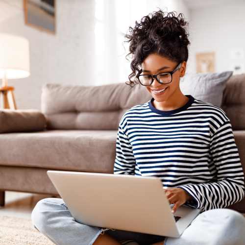 Resident on her laptop at Zinc 1501 in Sacramento, California  