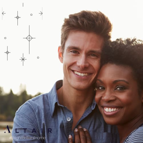 Resident couple giving a pose near Altair At The Preserve in O'Fallon, Missouri