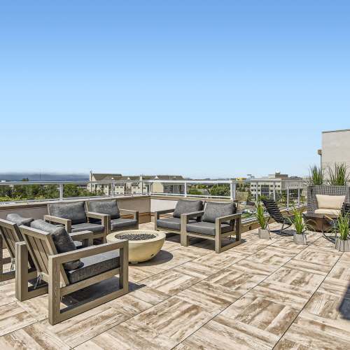 Seating around the firepit in the rooftop mezzanine at Elevation @ County Line Station in Englewood, Colorado