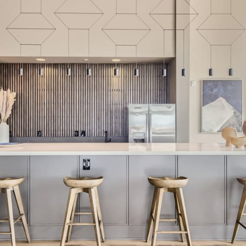 Bar seating at the island in the clubhouse kitchen at Elevation @ County Line Station in Englewood, Colorado