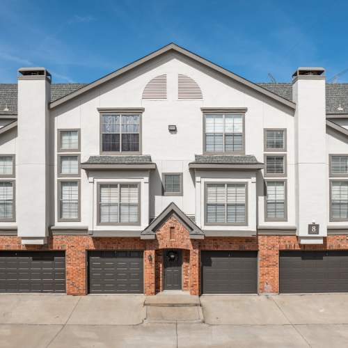 Garages under a townhome building at The Livingston in Plano, Texas