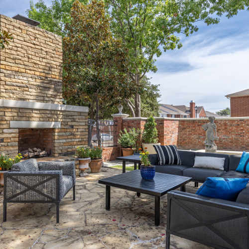 Seating around the outdoor fire pit at The Livingston in Plano, Texas