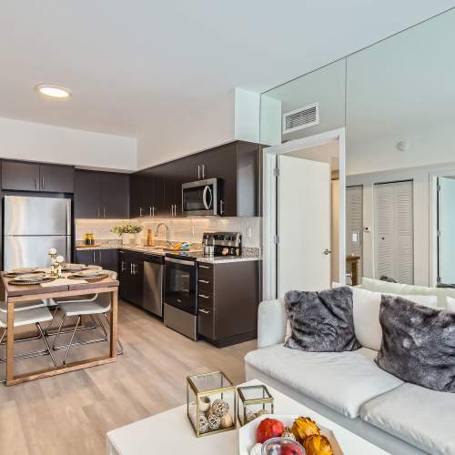 Kitchen and dining area of Amelia Apartments in Miami, Florida