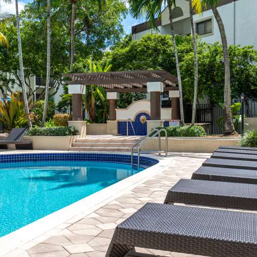 Relaxing pool deck at Emerald Palms in Miami, Florida