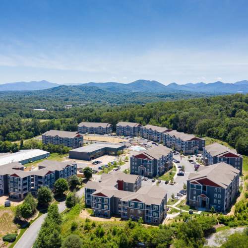 Aerial view of the community with trees all around at 10 Newbridge in Asheville, North Carolina