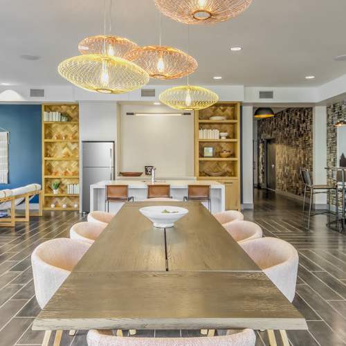 Premium-looking clubhouse with a large table at Marlowe Place in Charlotte,North Carolina
