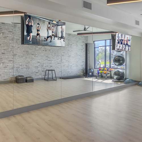 Large fitness studio with multiple TVs at Marlowe Place in Charlotte,North Carolina