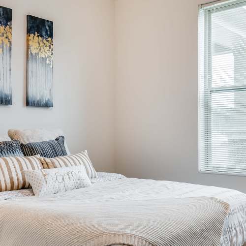 Comfortable bedroom at Eva Manor in Pleasant Prairie, Wisconsin