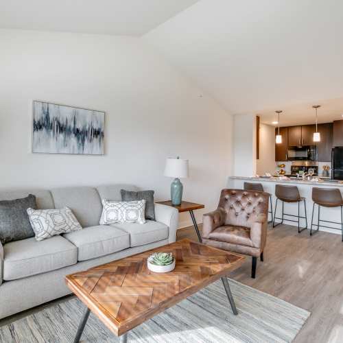 Living room with wood-style flooring at Whitetail Ridge in Salem, Wisconsin