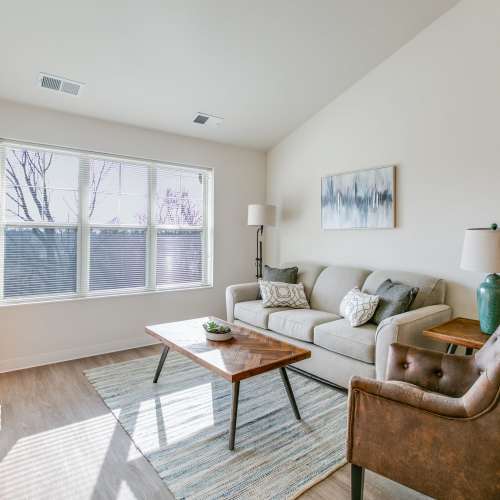 Living room with a comfortable couch at Whitetail Ridge in Salem, Wisconsin