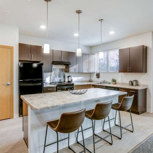 Apartment kitchen with ambient lighting at Whitetail Ridge in Salem, Wisconsin