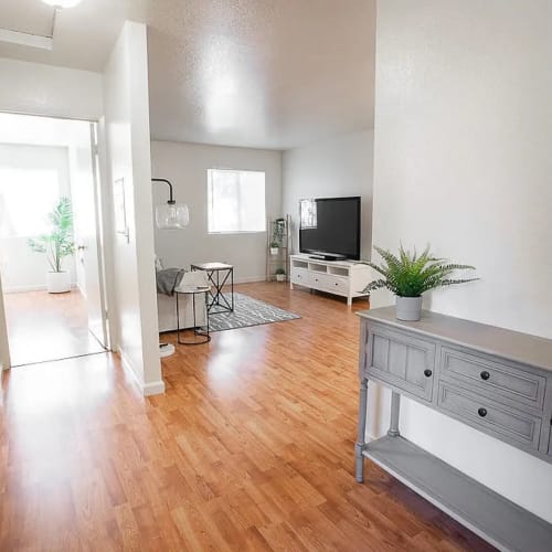 Living room with hardwood flooring at Walnut Apartments in Santa Rosa, California