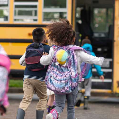 Resident children going for school bus near Bridges at San Ramon in San Ramon, California