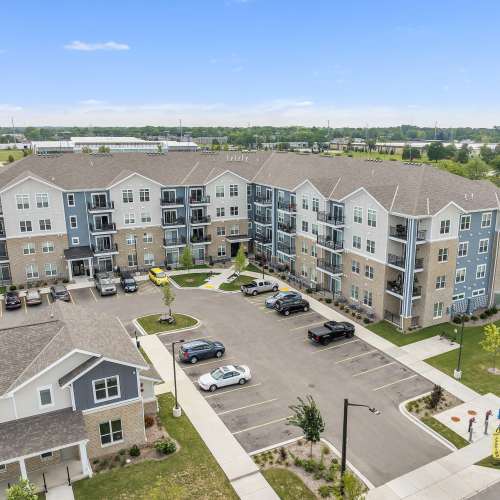 Community aerial view with parking space view at Union Court Senior Apartments and Townhomes in Kenosha, Wisconsin