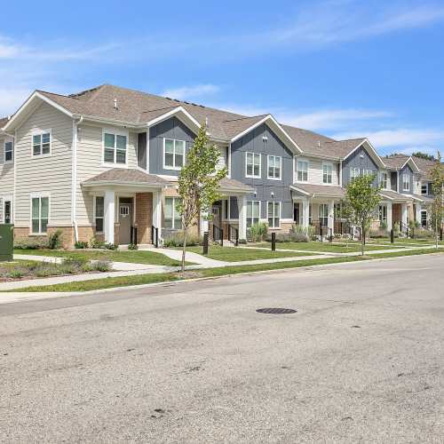 Community building with driveway at Union Court Senior Apartments and Townhomes in Kenosha, Wisconsin