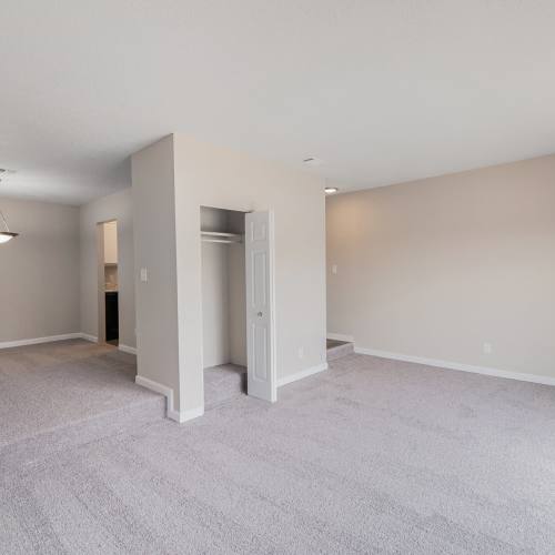 Living room with access to balcony at HighPointe Apartments in Birmingham, Alabama
