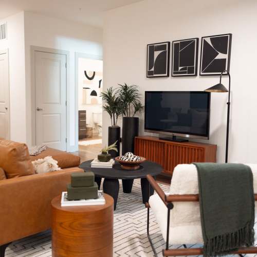 Living room with flat-screen TV at Legends 267 Apartments in Kansas City, Kansas