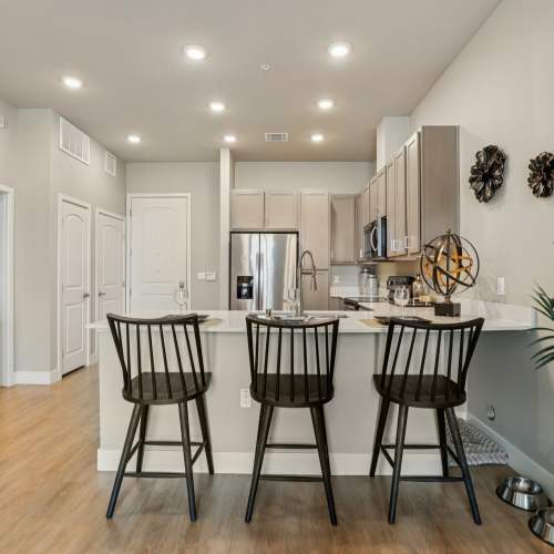 Breakfast bar and kitchen in  BDX at Capital Village