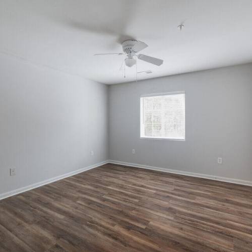 Bedroom with a window and a ceiling fan at Sabal Palms in Charleston, South Carolina