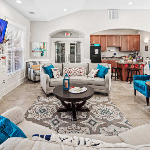 Resident clubhouse with modern finishes and lounge seating at Dilworth in Asheville,North Carolina