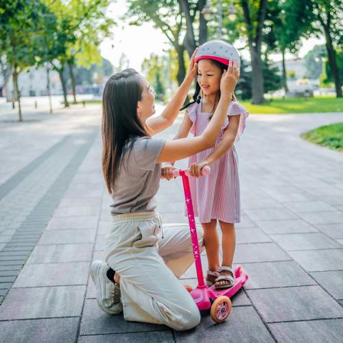 Woman playing in the park near River Run Village in San Diego, California