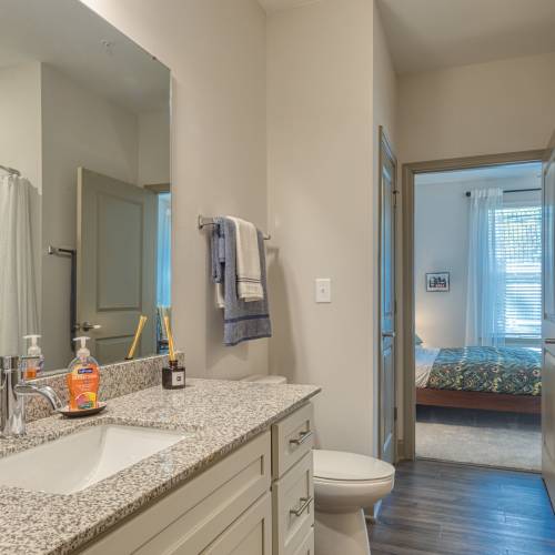 Bathroom with wooden flooring at The View at Blue Ridge Commons in Roanoke, Virginia