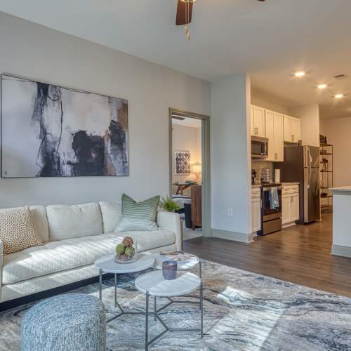 Living room with large size wall art at The View at Blue Ridge Commons in Roanoke, Virginia