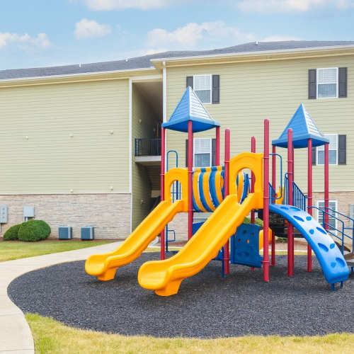 Community playground with slides and climbing equipment at Villas at Marlin Bay in Clover, South Carolina