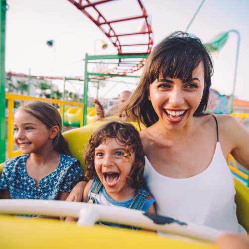 Resident family in amusement park near Main Street Apartments in Bensenville, Illinois